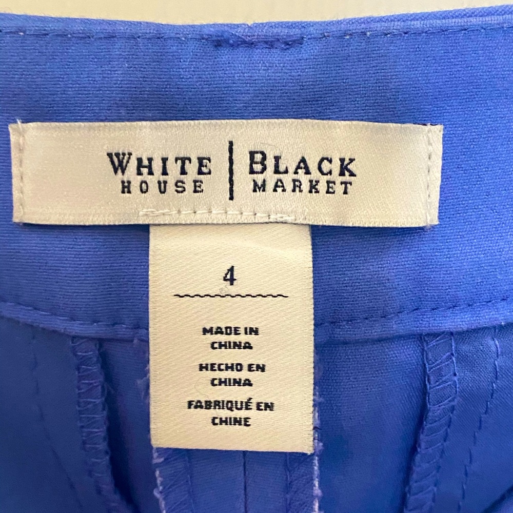 Blue slacks who are hip hugging. Only used twice.